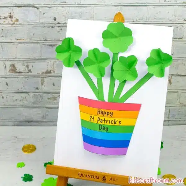 St. Patrick's Day Crafts For Kids - Cultivating Brilliant Minds a 3d craft that uses paper to create a rainbow 3d pot and 3d shamrock flowers