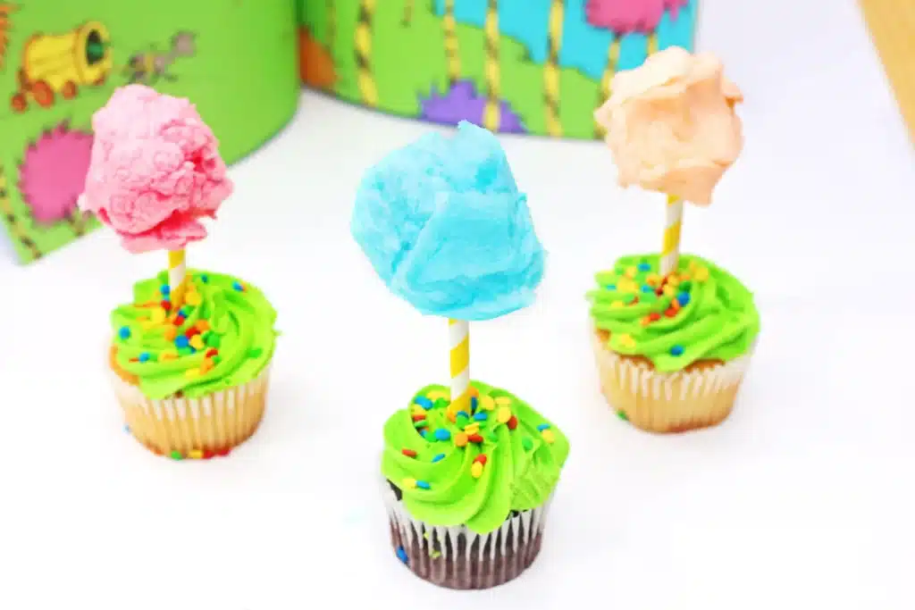 Truffula Tree Cupcakes - Cultivating Brilliant Minds truffula tree cupcakes that are cupcakes with a straw in them that have cotton candy attached to the top