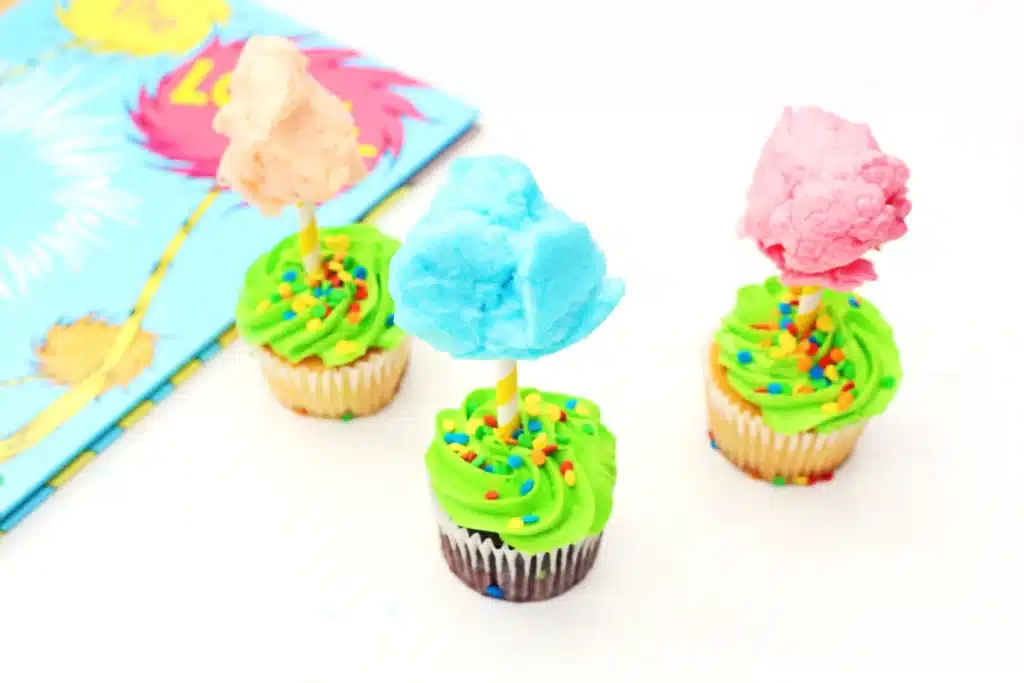 Truffula Tree Cupcakes - Cultivating Brilliant Minds truffula tree cupcakes that are cupcakes with a straw in them that have cotton candy attached to the top