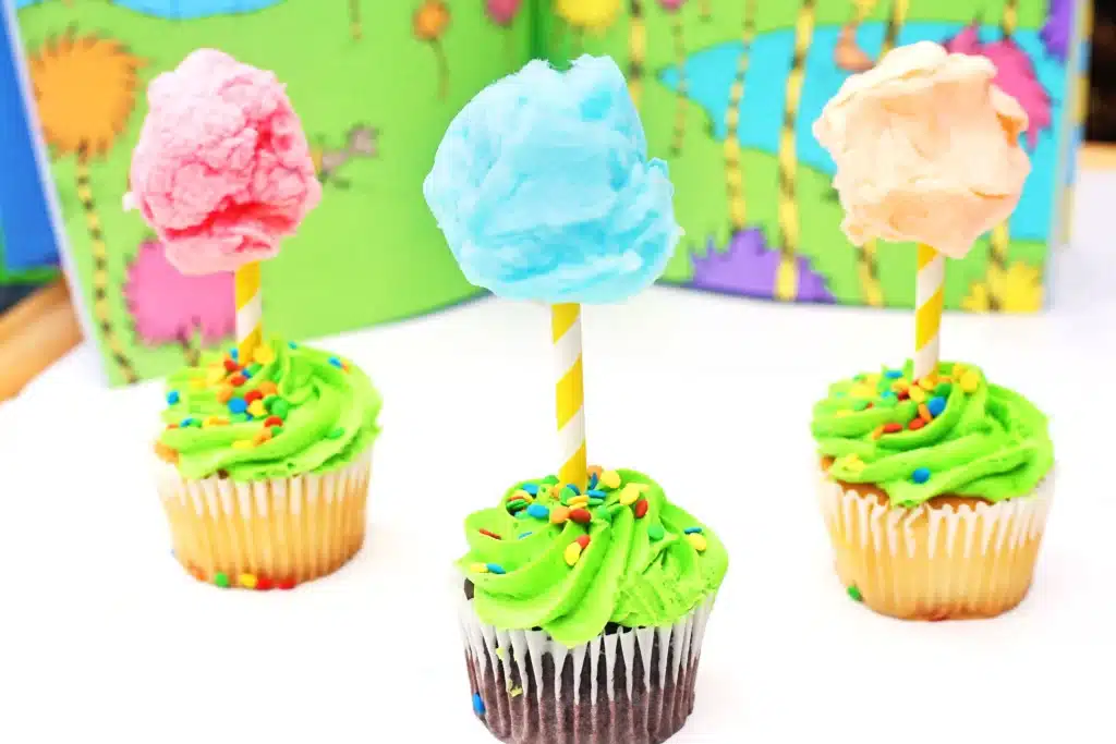 Truffula Tree Cupcakes - Cultivating Brilliant Minds truffula tree cupcakes that are cupcakes with a straw in them that have cotton candy attached to the top