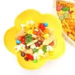 Zoo Snack Mix - Cultivating Brilliant Minds a zoo snack tray that has animal crackers, goldfish, pretzels, popcorn, m&ms and gummy bears