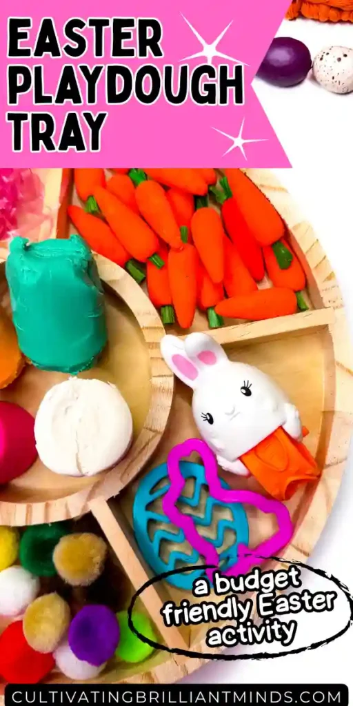 an easter playdough tray with playdough, cookie cutters, easter grass, pom poms, and mini carrots