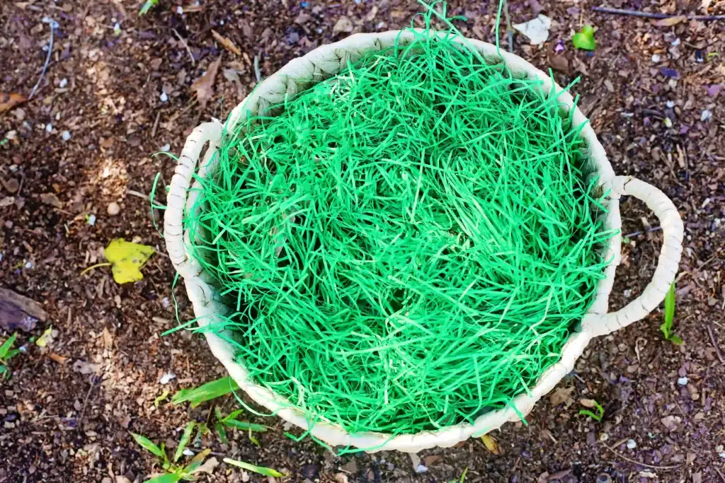 Dinosaur Easter Basket For Kids - Cultivating Brilliant Minds an easter basket filled with paper easter grass