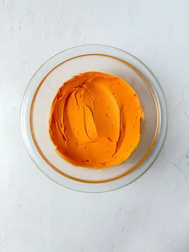 Carrot Cake Jars For Easter - Cultivating Brilliant Minds buttercream icing dyed orange