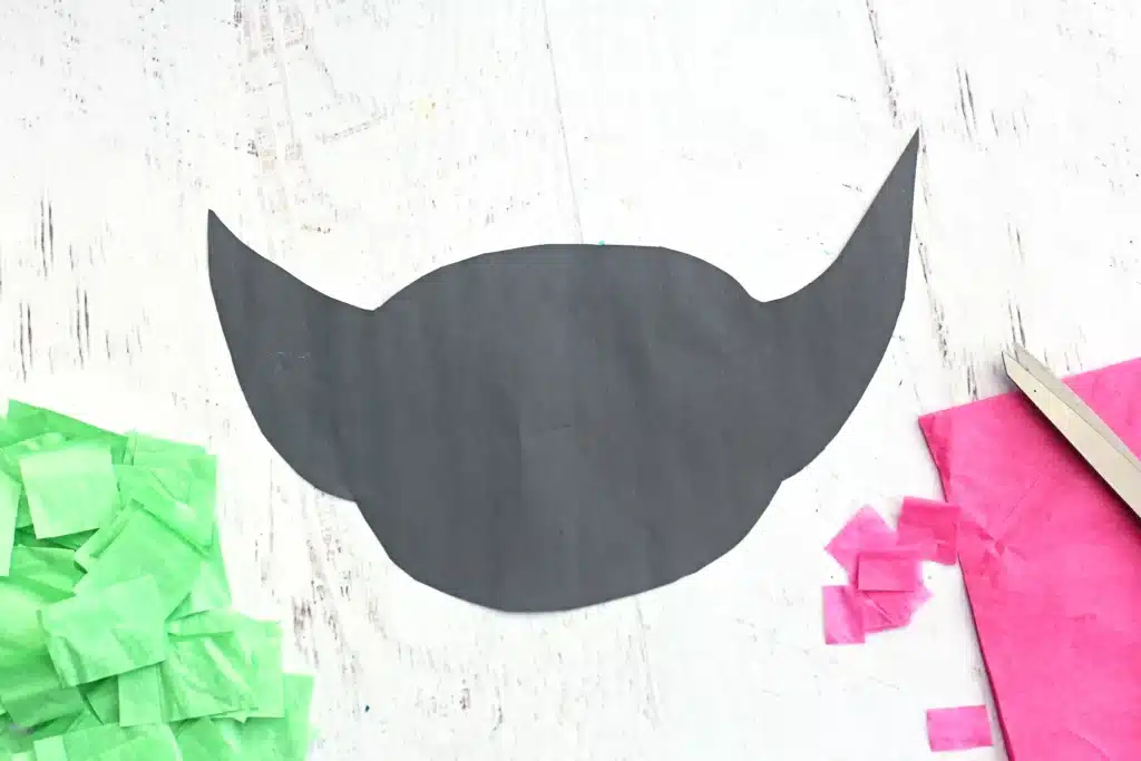 Baby Yoda Sun Catcher - Cultivating Brilliant Minds a baby yoda head cut out of black construction paper