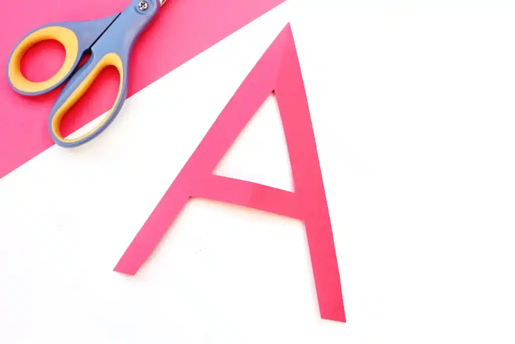 Letter A Apple Craft - Cultivating Brilliant Minds the letter a cut out of red construction paper