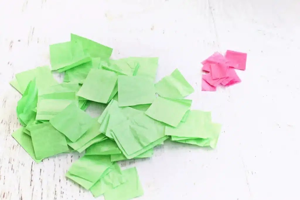 Baby Yoda Sun Catcher - Cultivating Brilliant Minds green and pink tissue paper cut into small squares