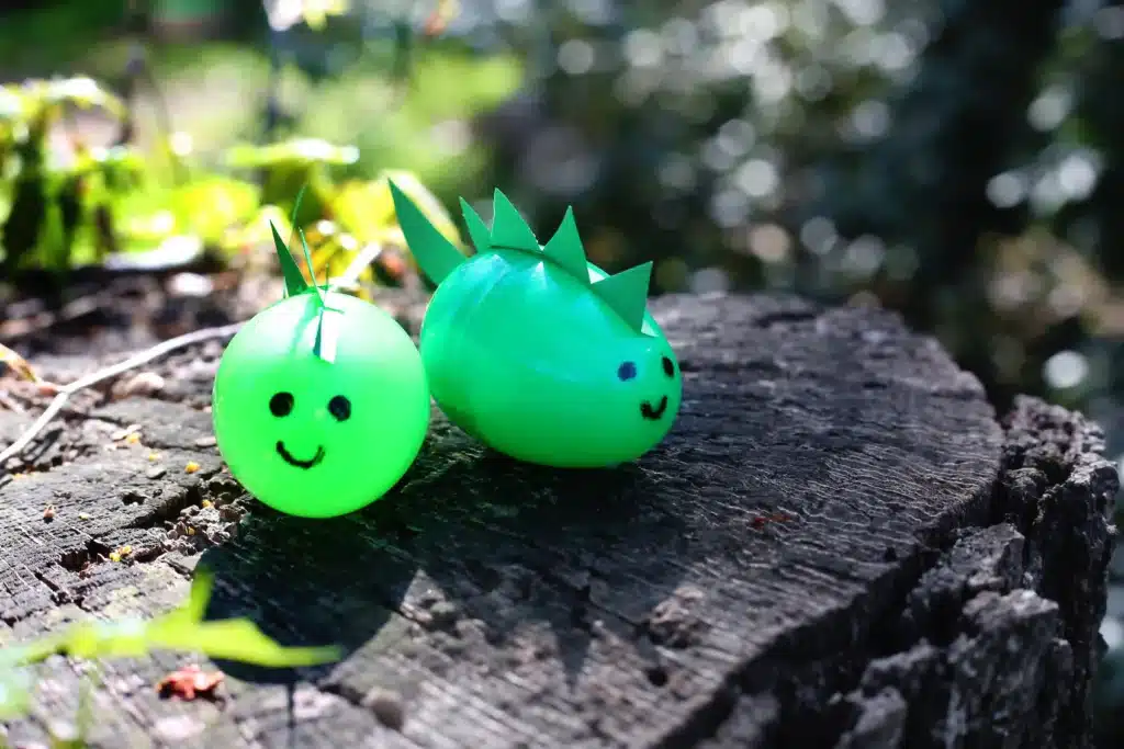 Dinosaur Easter Basket For Kids - Cultivating Brilliant Minds plastic easter eggs decorated to look like dinosaurs