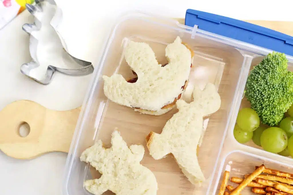 Dinosaur Lunch Idea - Cultivating Brilliant Minds a dinosaur lunch idea for kids that has sandwiches cut into the shape of dinosaurs
