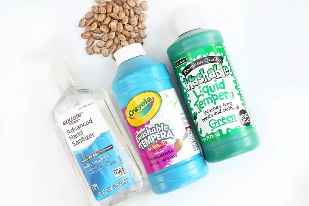 Bean Earth Day Mosaic - Cultivating Brilliant Minds dry pinto beans, hand sanitizer, and green and blue paint