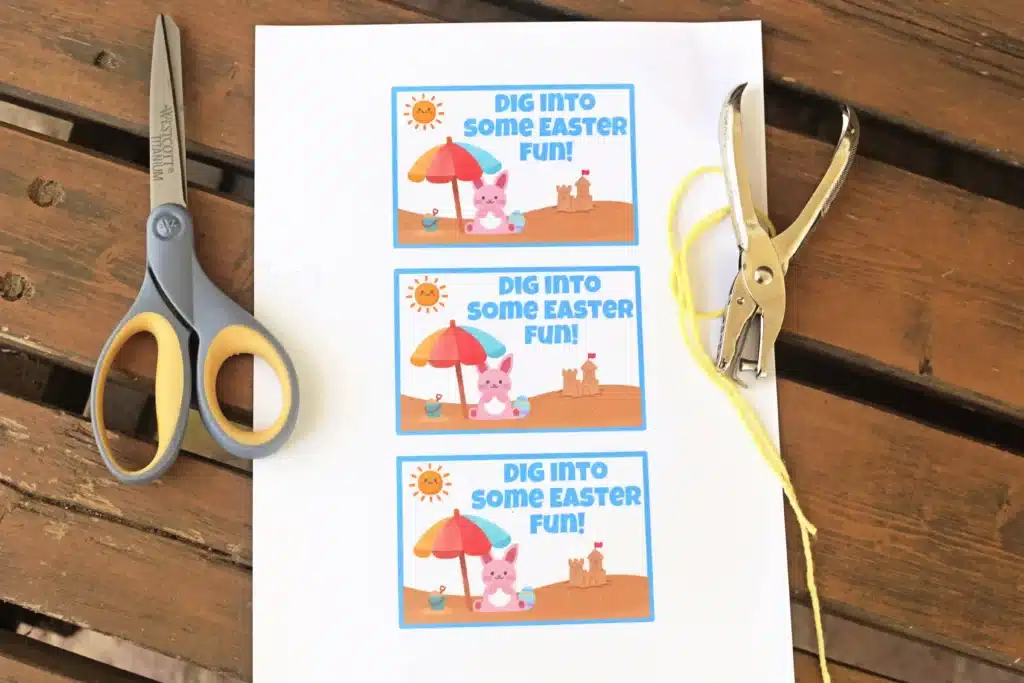 Beach Easter Basket Idea - Cultivating Brilliant Minds a printable easter tag that reads "dig into some easter fun" with a picture of a bunny on the beach