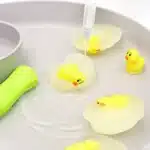 Frozen Chick Rescue Activity - Cultivating Brilliant Minds toy chicks frozen in water
