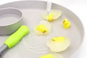 toy chicks frozen in water