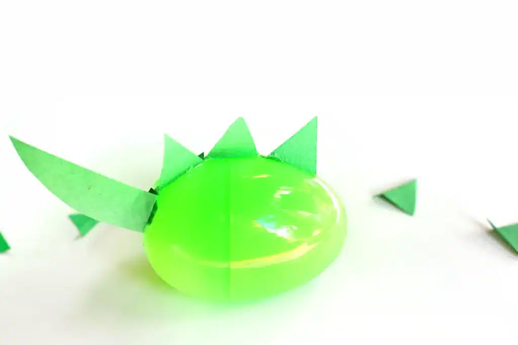 Dinosaur Easter Basket For Kids - Cultivating Brilliant Minds plastic easter eggs decorated to look like dinosaurs