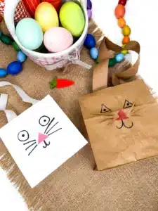 paper bags decorated to look like bunnies