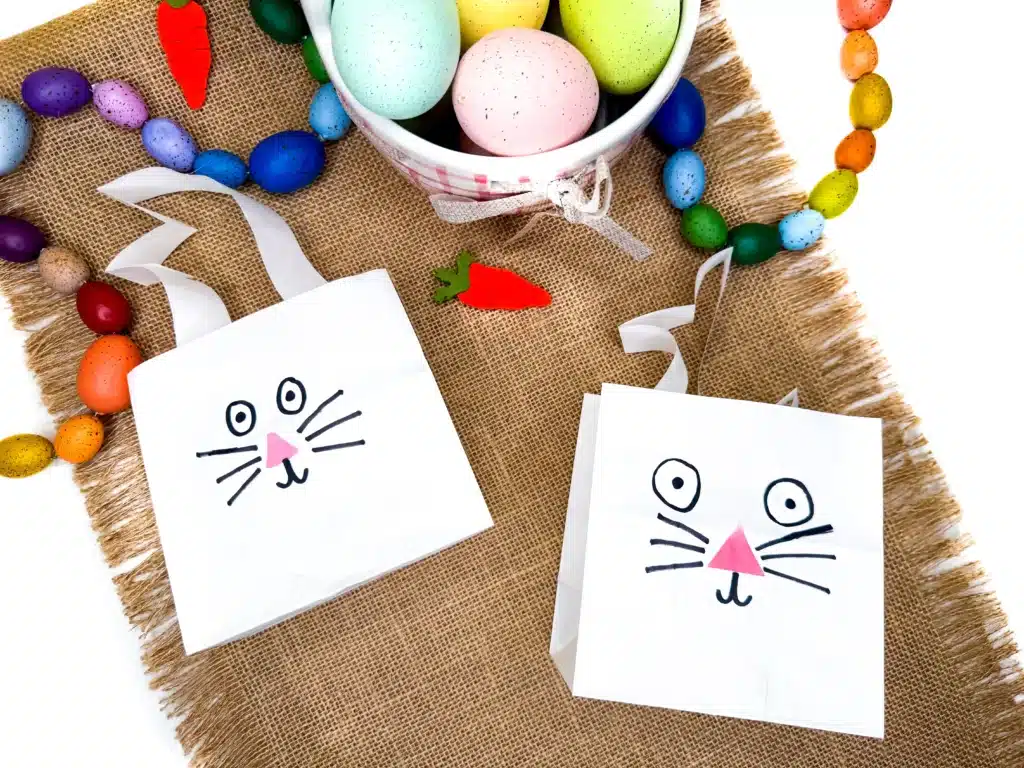 Paper Bag Bunny Basket Craft - Cultivating Brilliant Minds a paper bag bunny basket craft that is a paper bag decorated with a bunny face