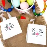 Paper Bag Bunny Basket Craft - Cultivating Brilliant Minds a paper bag bunny basket craft that is a paper bag decorated with a bunny face