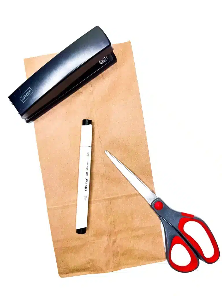 Paper Bag Bunny Basket Craft - Cultivating Brilliant Minds a brown paper bag, black marker, stapler, and scissors are the supplies for this easy easter craft