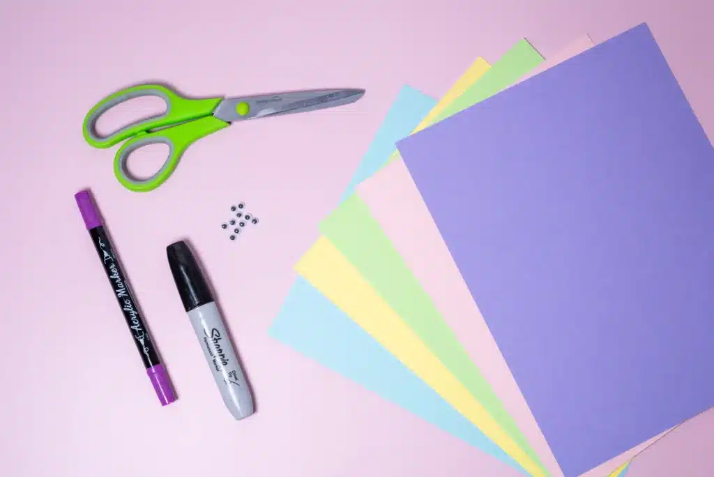 Bunny Handprint Craft - Cultivating Brilliant Minds colored construction paper, scissors, googly eyes, and markers