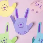 Bunny Handprint Craft - Cultivating Brilliant Minds a bunny handprint craft that is a handprint cut out of construction paper decorated to look like a bunny