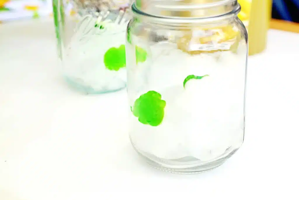 Frog Pond Punch - Cultivating Brilliant Minds ice cubes and frog gummies is a mason jar