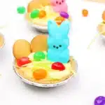 Peeps banana pudding mini pies - Cultivating Brilliant Minds a banana pudding mini pie with nilla wafers, edible grass, jelly beans, and a peeps bunny