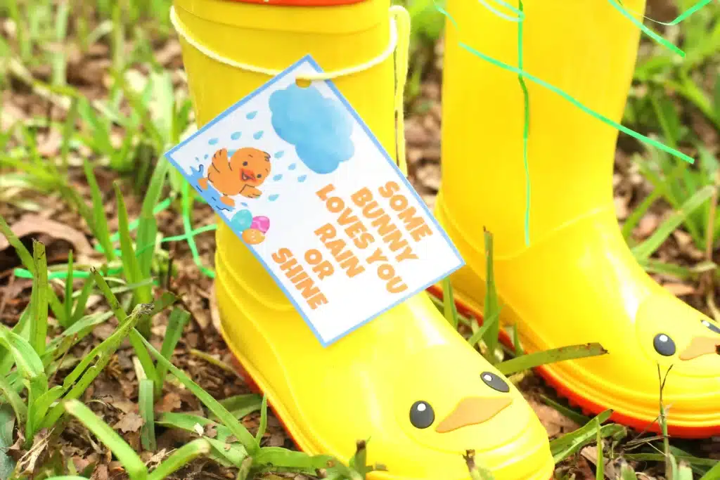 Rain boots Easter basket for kids - Cultivating Brilliant Minds a printable tag on rain boots that reads " some bunny loves you rain or shine"