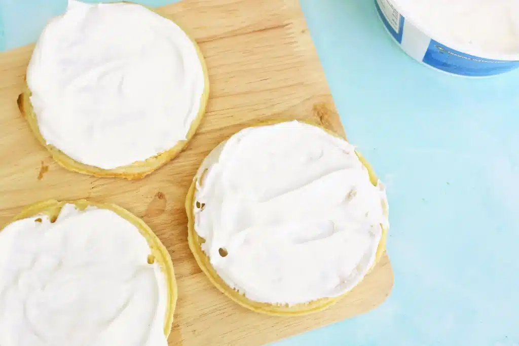 Butterfly Garden Waffles: A Spring Breakfast Idea For Kids - Cultivating Brilliant Minds whipped cream spread on waffles