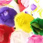 Spring Flower Fine Motor Activity - Cultivating Brilliant Minds a spring flower fine motor activity that has an egg carton painted different colors with the same color flowers inside