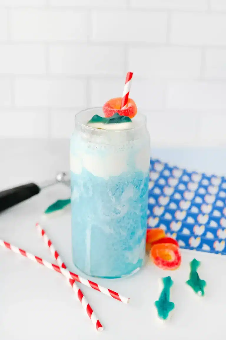 a shark week drink of a shark float made of blue hawaiian punch and ice cream