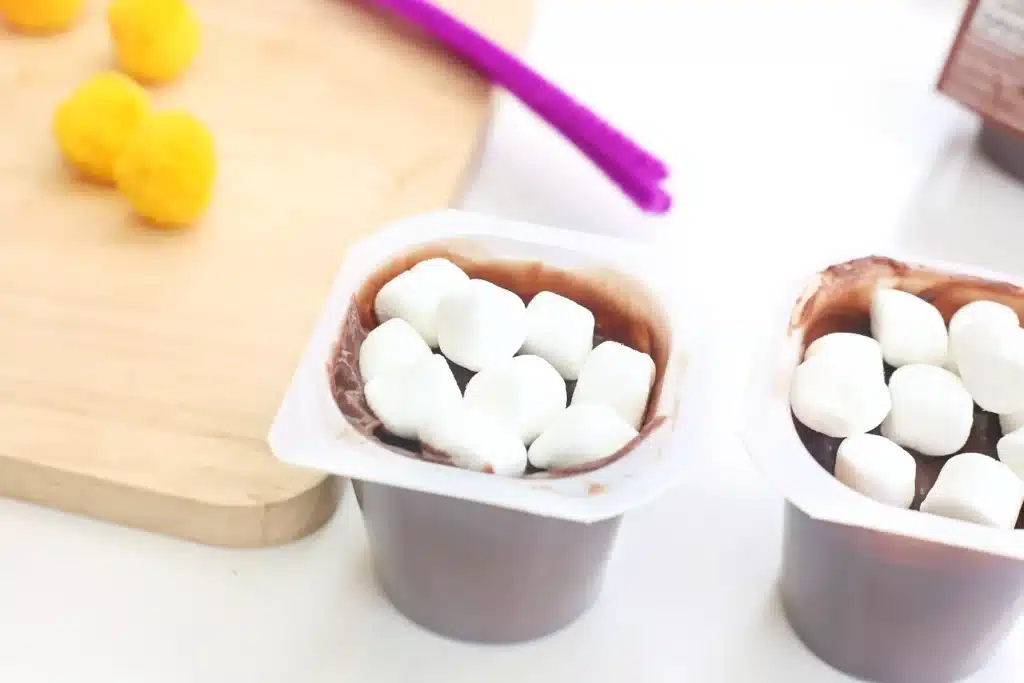 Flower Pot Parfait Cups - Cultivating Brilliant Minds marshmallows in a chocolate pudding cup