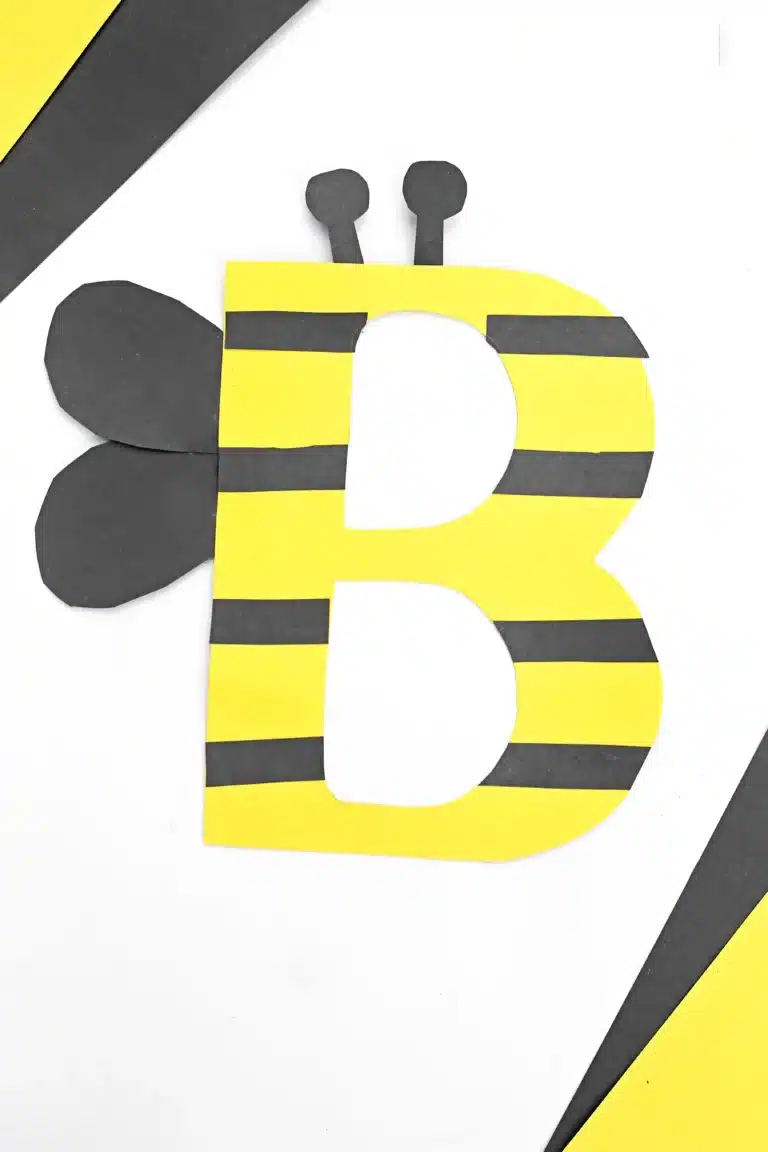 a letter b craft that uses yellow construction paper b decorated with black stripes and wings