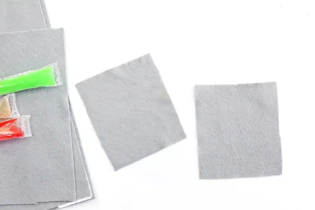 Felt Lightsaber Popsicle Holders - Cultivating Brilliant Minds gray felt cut into squares