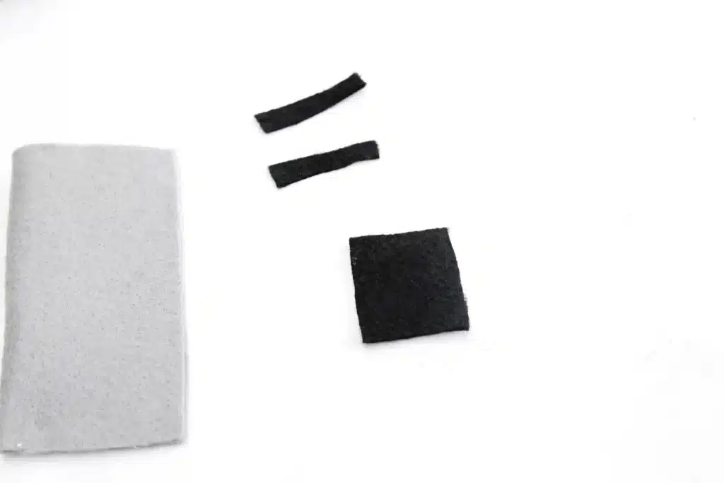 Felt Lightsaber Popsicle Holders - Cultivating Brilliant Minds black felt cut into a square and two rectangles