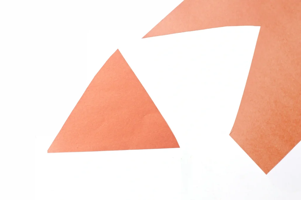 Letter H House Craft - Cultivating Brilliant Minds orange triangle cut out of construction paper