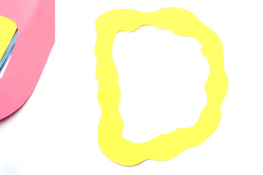 Letter D Craft - Cultivating Brilliant Minds a squiggly letter d cut out of yellow construction paper