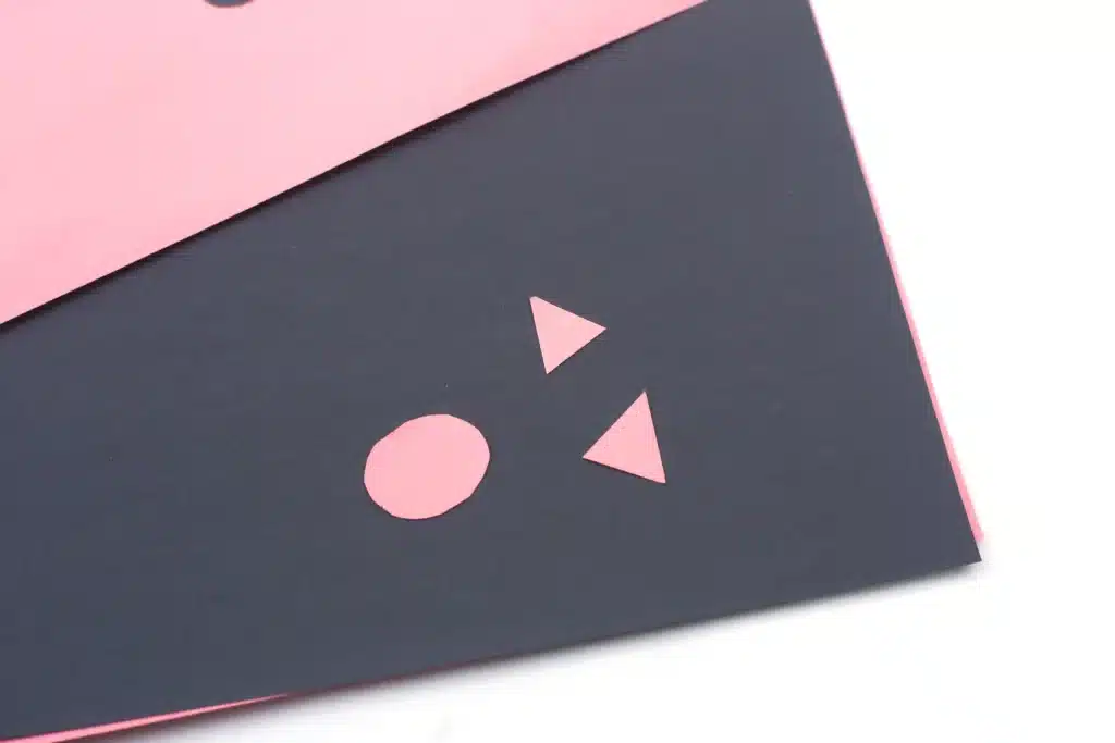 Letter C Cat Craft - Cultivating Brilliant Minds nose and ears cut out of pink construction paper