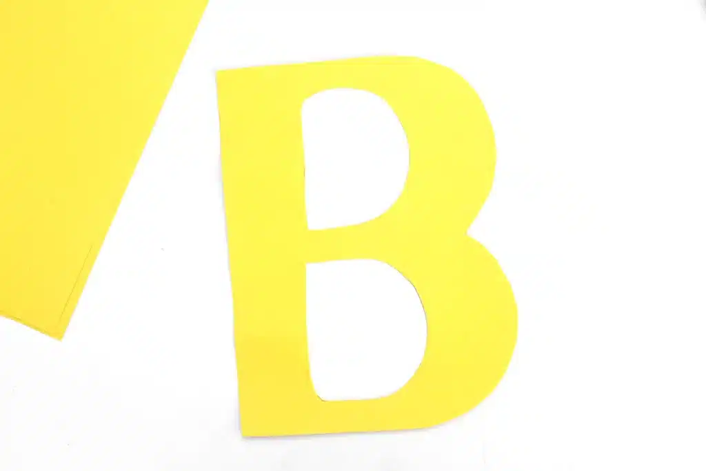 Letter B Bee Craft - Cultivating Brilliant Minds a capital letter b cut out of yellow construction paper