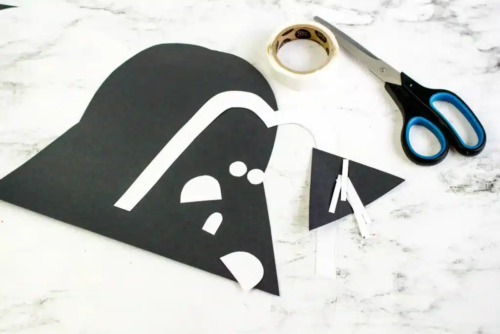 Darth Vader Hat - Cultivating Brilliant Minds pieces of darth vaders mask cut out of construction paper