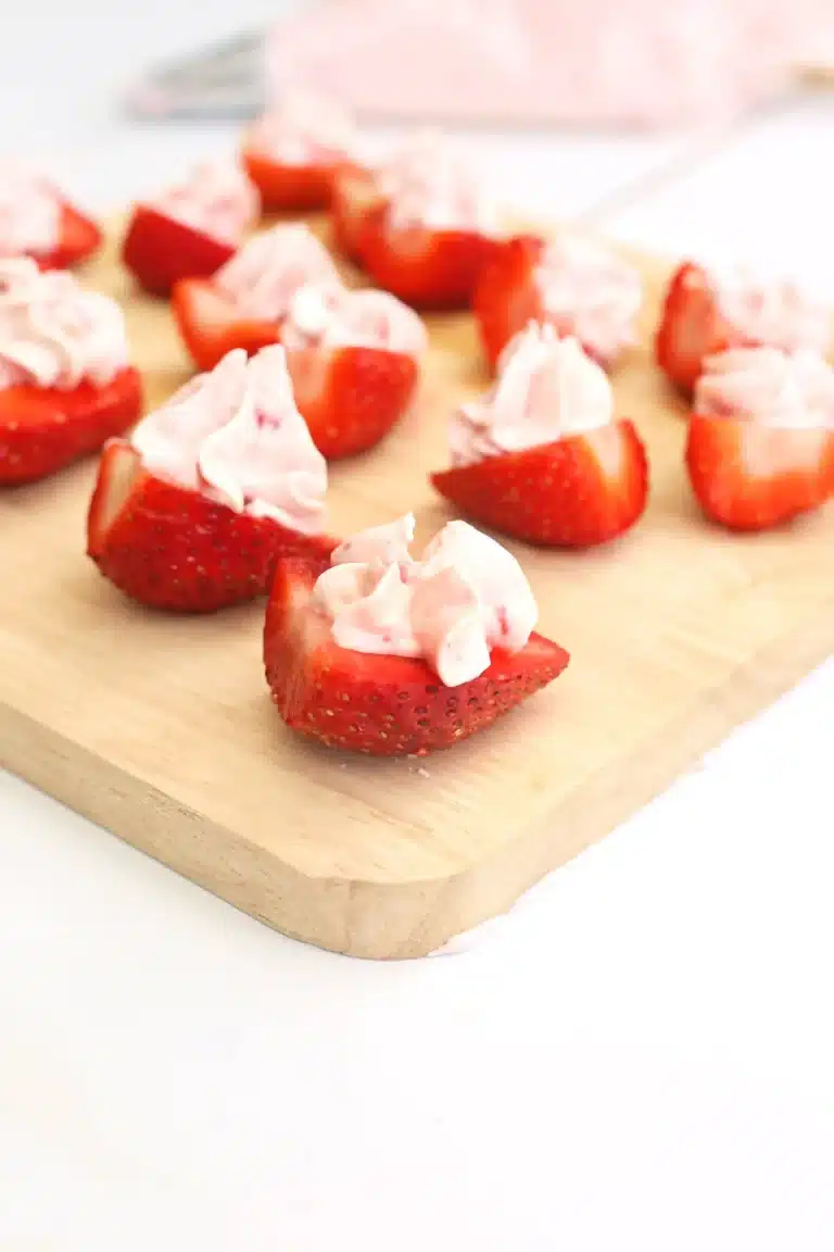 strawberries with a strawberry cream cheese filling on top