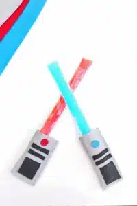 a felt lightsaber popsicle holder that looks like a light saber