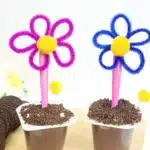 Flower Pot Parfait Cups - Cultivating Brilliant Minds flower pot parfait cups with marshmallows, crushed oreos, and a flower spoon
