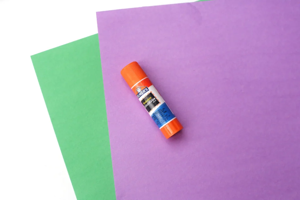 Letter G Grape Craft - Cultivating Brilliant Minds green and purple construction paper and a glue stick