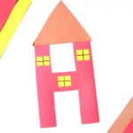 a letter h cut out of construction paper and decorated to look like a house
