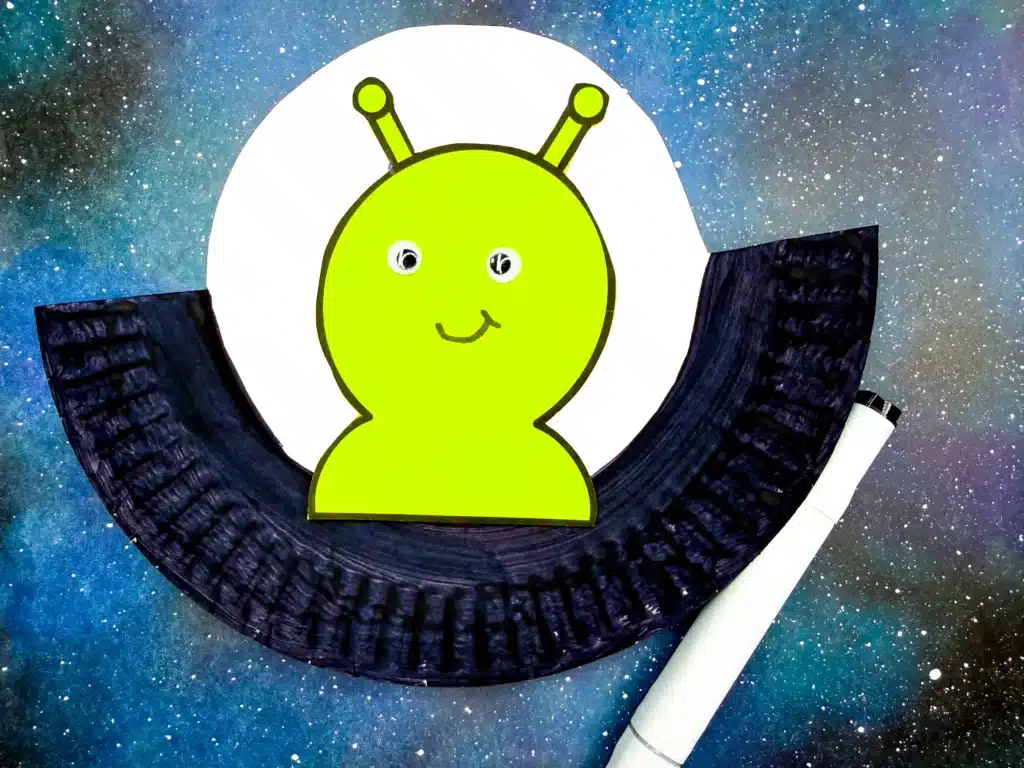 UFO Paper Plate Craft - Cultivating Brilliant Minds an alien craft that has an alien inside a paper plate ufo