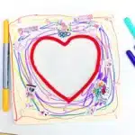Picture Frame Decorating Tray - Cultivating Brilliant Minds a square wooden picture frame with a heart in the middle decorated with stickers and markers