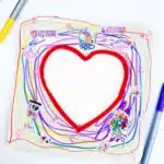 Picture Frame Decorating Tray - Cultivating Brilliant Minds a square wooden picture frame with a heart in the middle decorated with stickers and markers