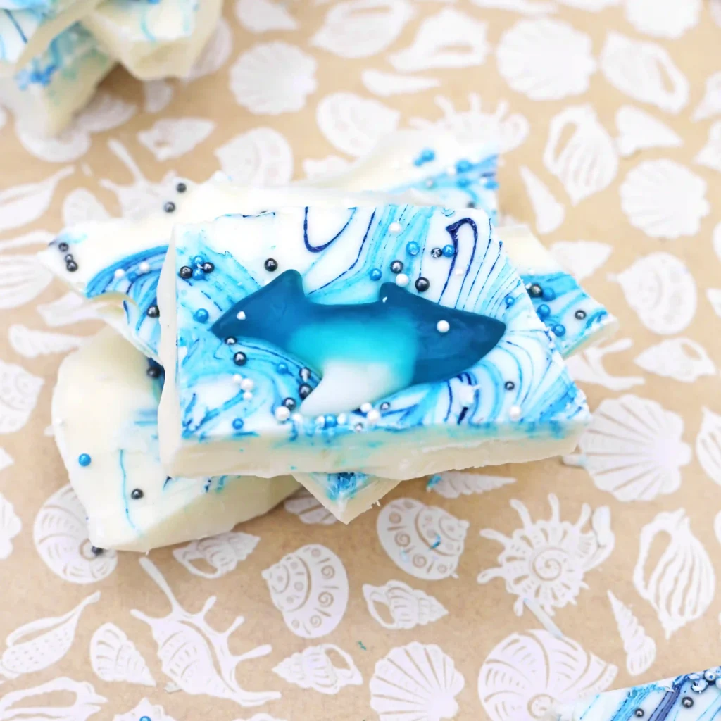 Shark Bark - Cultivating Brilliant Minds white chocolate bark with gummy sharks and sprinkles