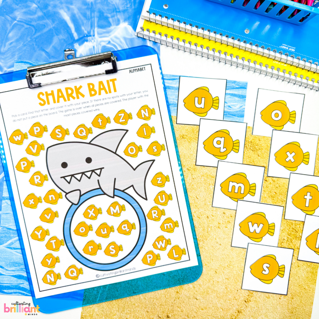 shark themed printable board games focuses on learning the alphabet, phonics patterns, and math concepts