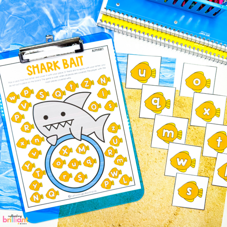 shark themed printable board games focuses on learning the alphabet, phonics patterns, and math concepts